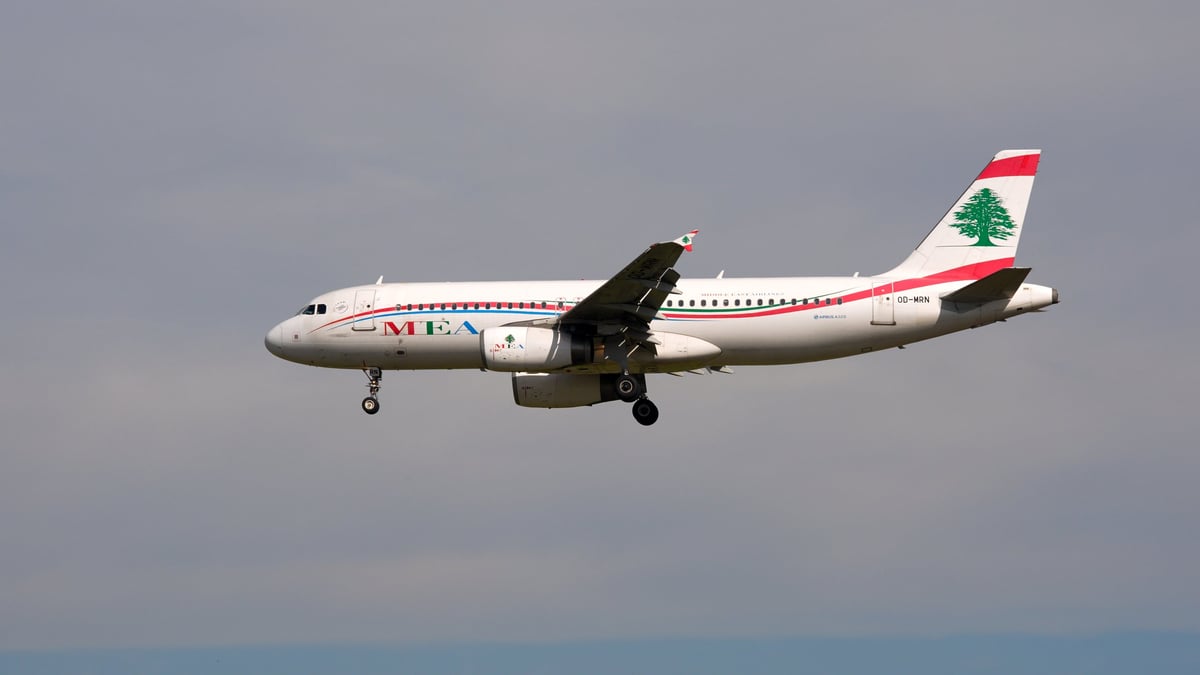 Side view of descending MEA passenger airplane type Airbus A320-232 registration OD-MRN landing at German Frankfurt Airport on a sunny spring day. Photo taken April 25th, 2026, Frankfurt am Main, Germany.