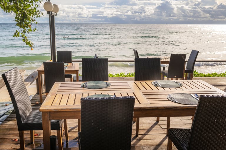 Beachfront dining with turquoise sea view
