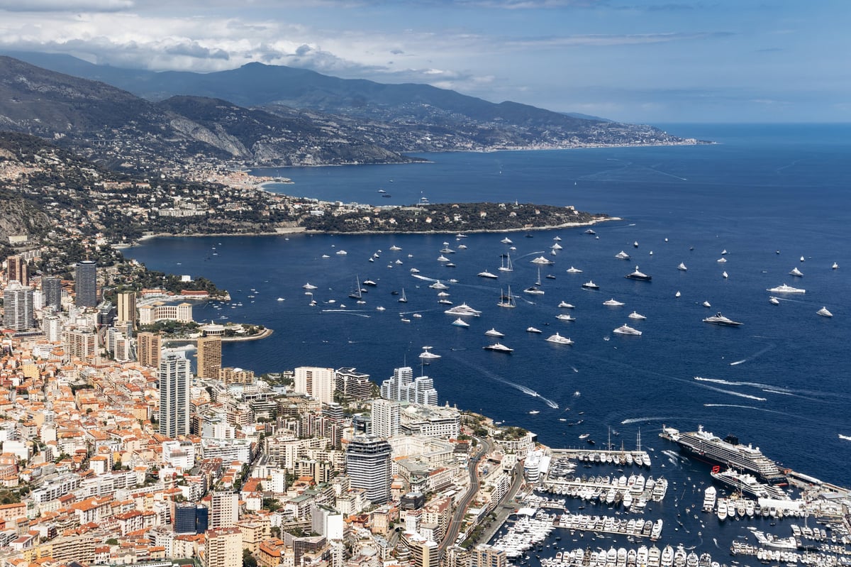 Panoramic aerial view of the Principality of Monaco from Tete de Chien overlooking Port Hercules, Monte Carlo and the Mediterranean Sea