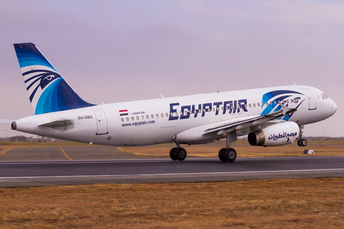 Nairobi, Kenya – September 11, 2015: An EgyptAir Airbus A320 rotates off the runway at Jomo Kenyatta International Airport