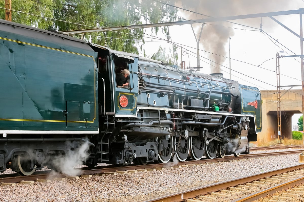 Rovos Rail luxury steam train with driver in South Africa — 5 star hotel on wheels
