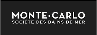 Monte Carlo Societe des Bains de Mer logo on dark background