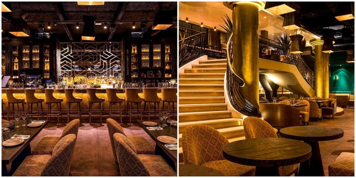 Luxury lounge interior with gold accents, plush seating, and modern lighting design