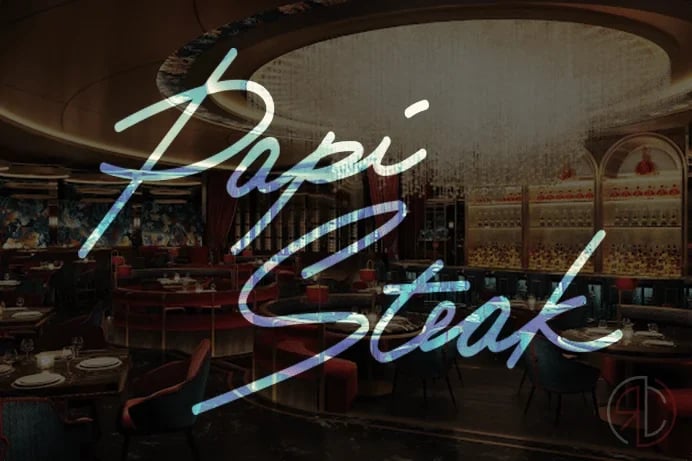 Neon sign reading Papi Steak displayed on a restaurant window with upscale interior visible behind
