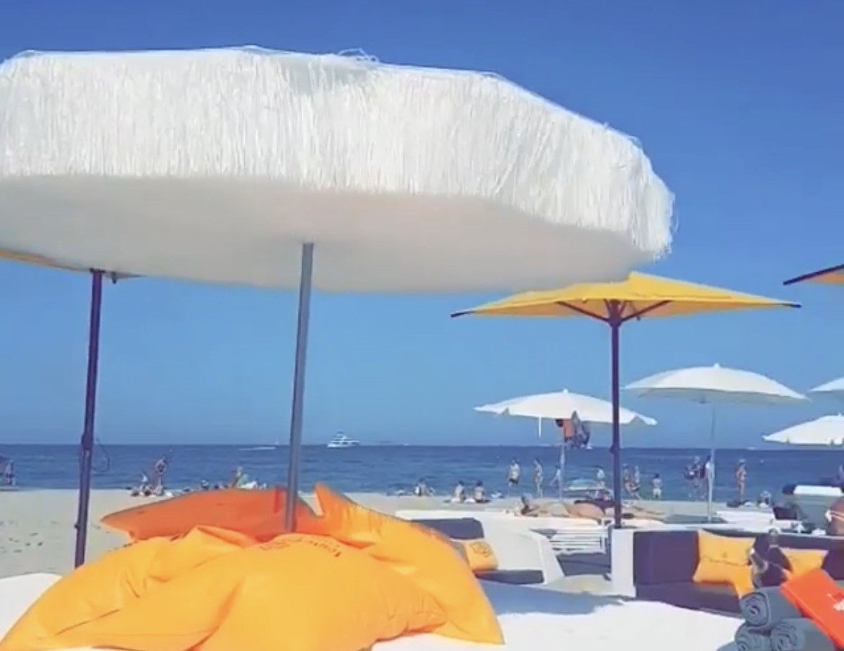 Ushuaïa beach club with sun loungers by the sea