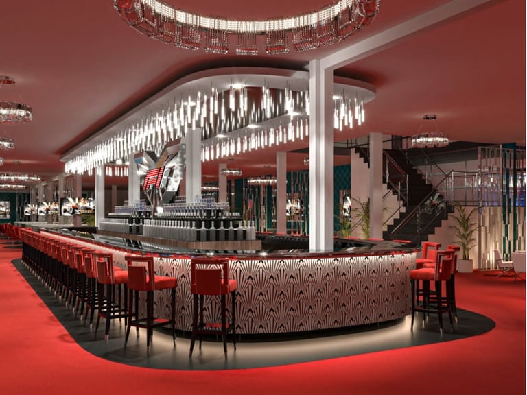 Modern bar interior with curved red seating, illuminated shelving, burgundy ceiling, and contemporary lounge design