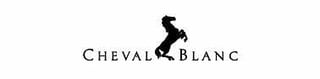 Cheval Blanc logo featuring a black silhouette of a rearing horse with company name