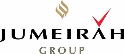 Jumeirah Group logo featuring stylized flame symbol and red checkmark above company name