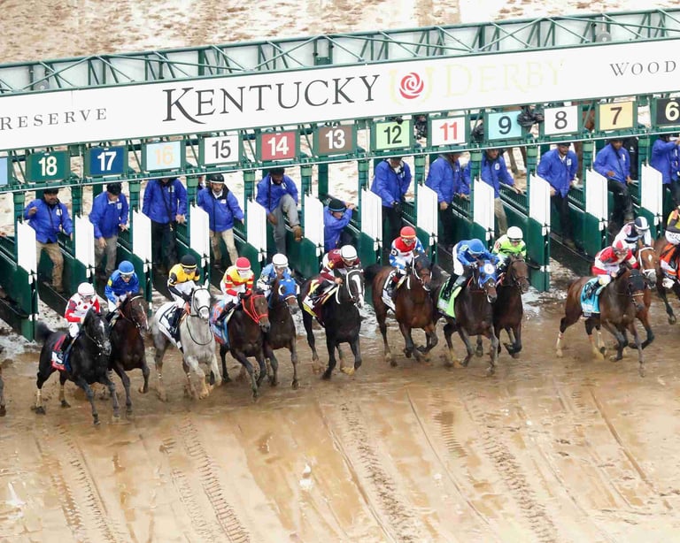 Horse racing at Churchill Downs with jockeys racing out of starting gates on dirt track during Kentucky Derby